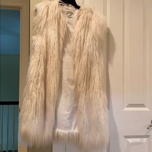 Zara Faux Fur sleeveless jacket .